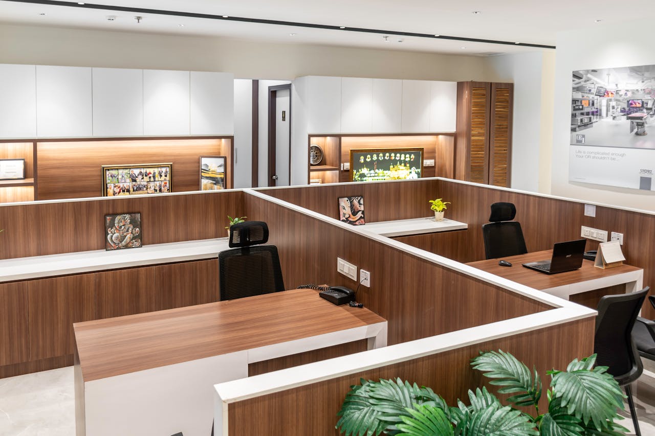 gallery-3 Contemporary office cubicles in a sleek, modern design with wood accents.